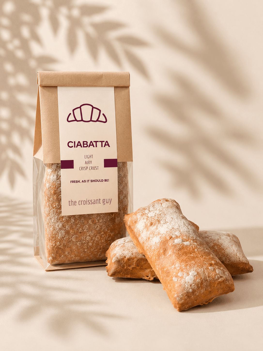 Freshly baked ciabatta bread with a golden crust and airy interior at The Croissant Guy Karachi